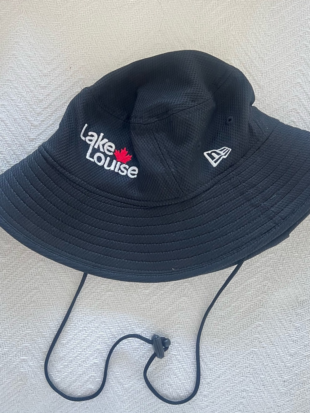 New Era Black Lake Louise Bucket Hat with Chin Cord